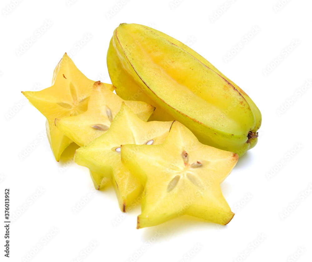 Fototapeta premium Carambola fruit with slices isolated on white background