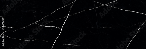 black marble texture background, black marble background with white veins © Obsessively
