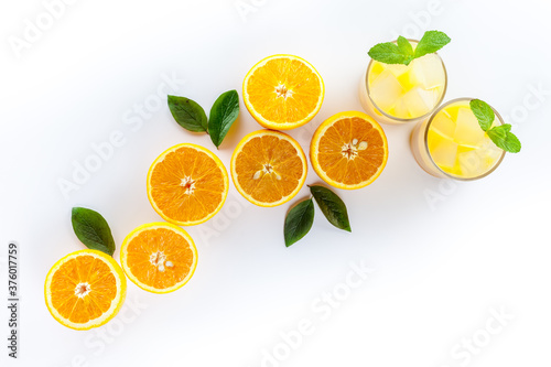 Glass of orange juice healthy drink on a white background top view copy space