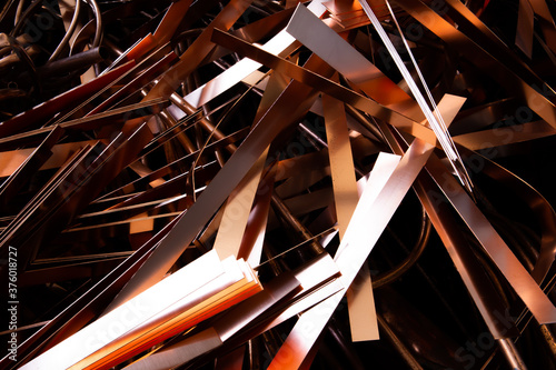 A scrap of old wired and sheet copper material from a recycling company in the purpose of wallpaper and background