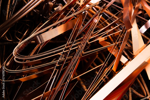 A scrap of old wired and sheet copper material from a recycling company in the purpose of wallpaper and background