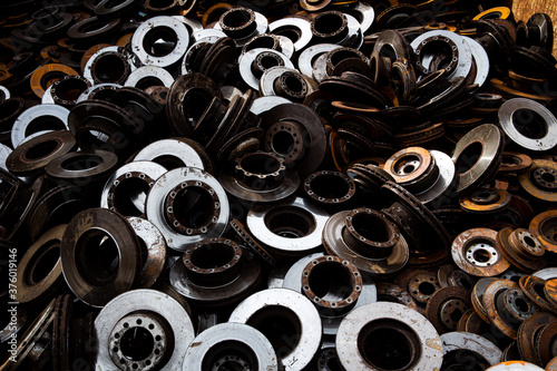 A scrap of Rusty brake discs from a recycling company for the purpose of background or wallpaper