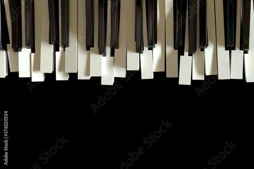 Broken piano keyboard as a symbol of expressive music and jazz.