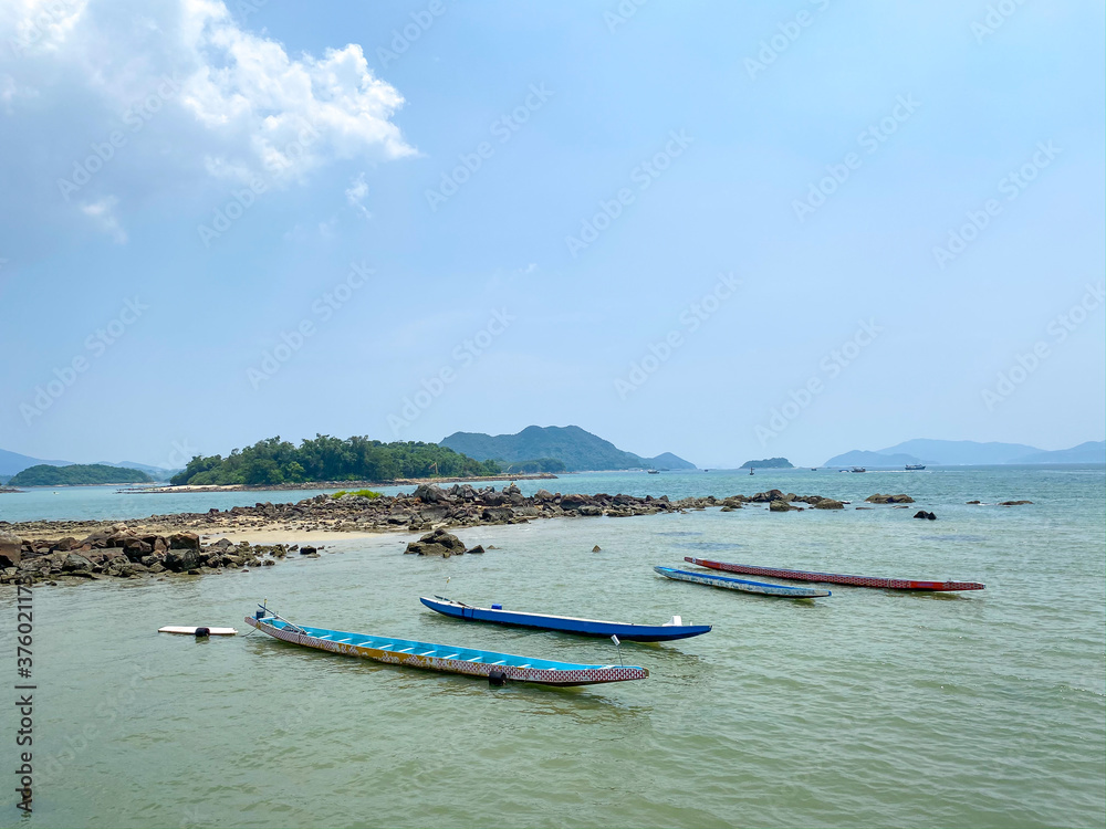 tropical beach with boats