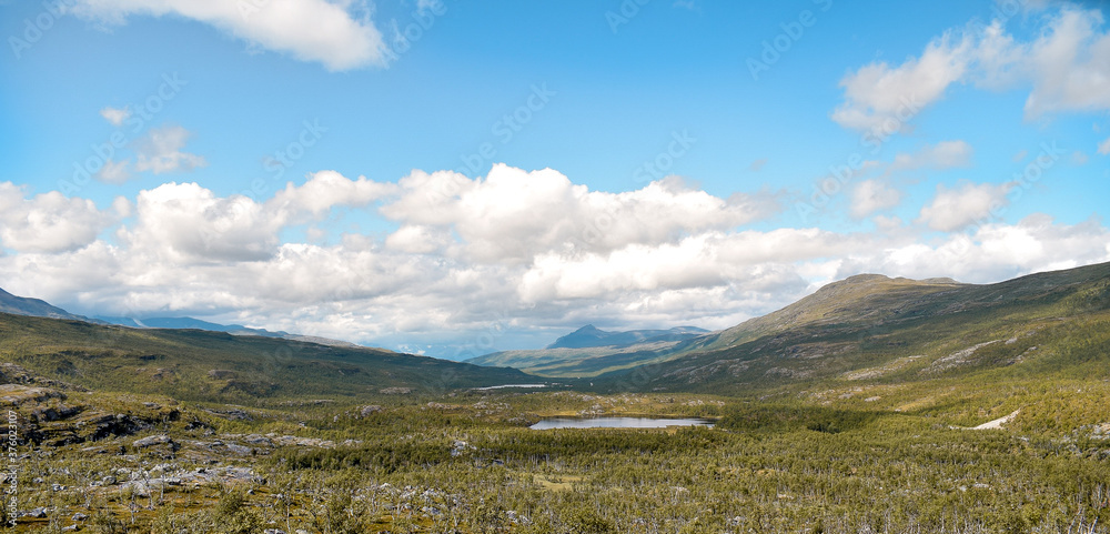 Mountain valley landscape with cloudy sky in northern Norway