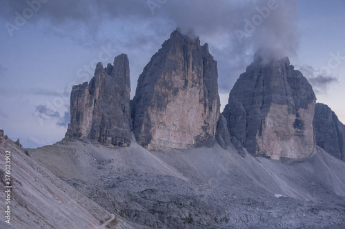 View of Tre Cime di Lavaredo, Cima Picolla, Cima Grande & Cima Oves summits at twilight as seen from Rfiugio Locatelli, Sesto Dolomites, Auronzo di Cadore, Alto-Adige, Bolzano, South Tirol, Italy.