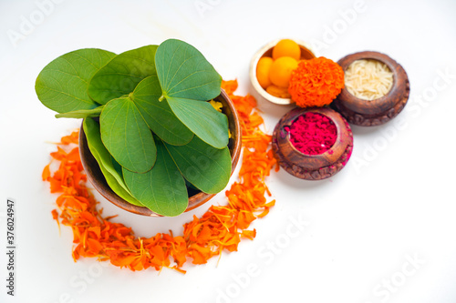 Happy Dussehra greeting card , green apta leaf and rice, Indian festival dussehra photo