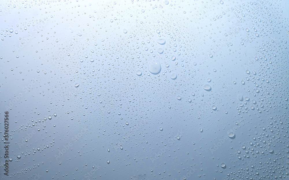 water drops on blue background water drops on blue background