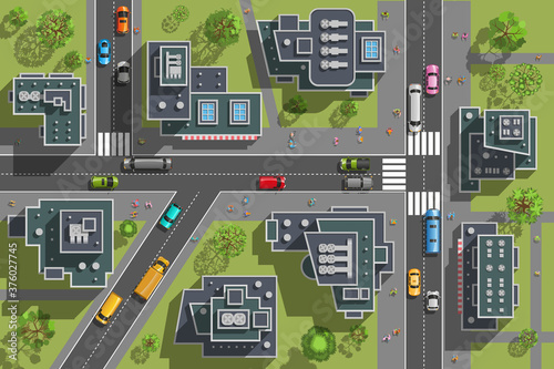 City top view. Streets, houses, buildings, roads, crossroads,  trees, cars. (view from above) 