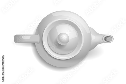 Ceramic teapot. Top view. White teapot. View from above.