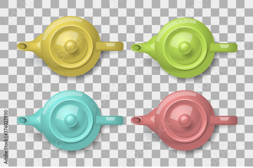 Ceramic teapots. Top view. A set of colorful pots. Kettles. View from above.
