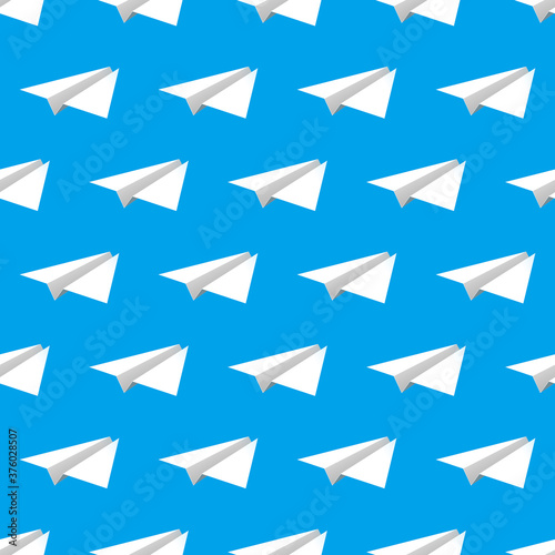 White paper airplanes over blue background, seamless pattern