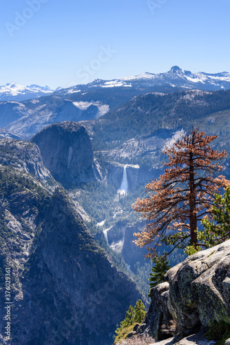 View of Vernal Fall and Nevada Falls, the Mist Trail, from Glacier Point with blue sky in summer, Yosemite National Park, California
