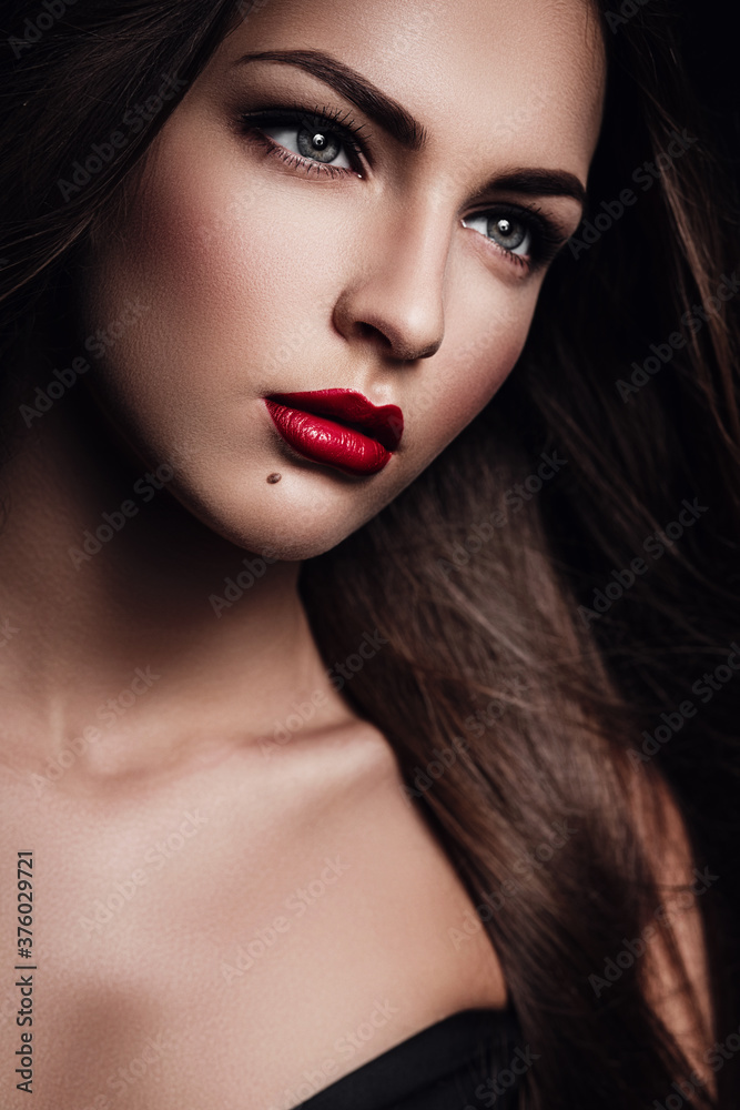 portrait of beautiful woman with red lips