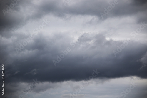 dark grey rainy cumulus clouds