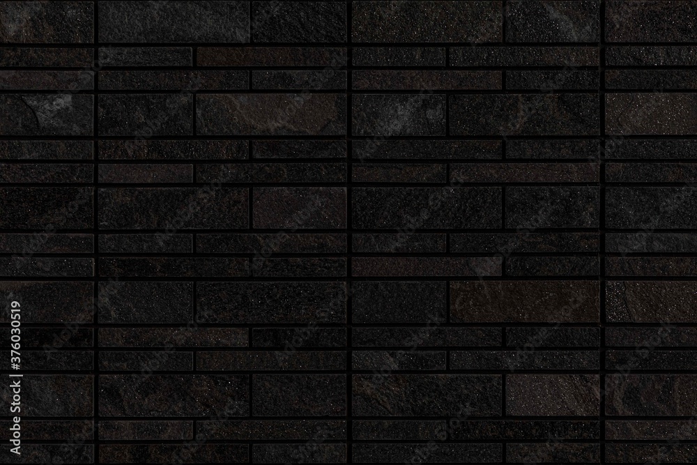 Black pattern of black stone cladding wall tile texture and seamless background Black pattern of black stone cladding wall tile texture and seamless background