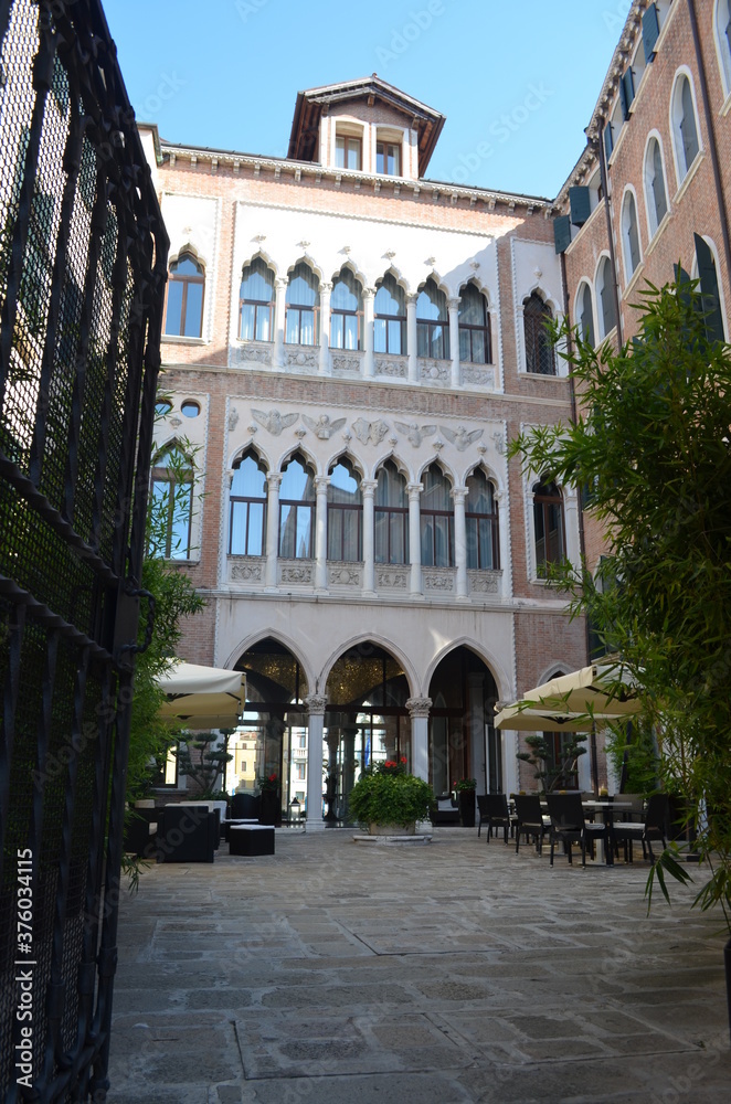 
internal courtyard with facade in typical Venetian architectural style