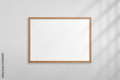 Mockup wood frame photo on wall. Mock up wooden picture framed. Horizontal boarder with shadow. Empty photoframe a4 on background wall. Border for design prints poster and painting image. Vector
