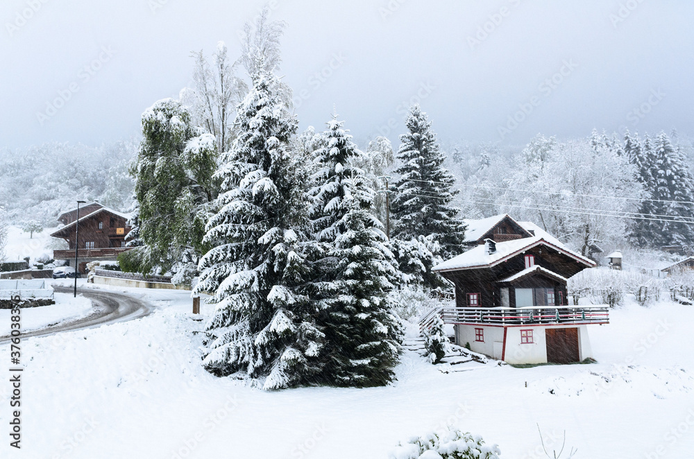 Mountain village in the French alps near the Geneva lake after a snowfall