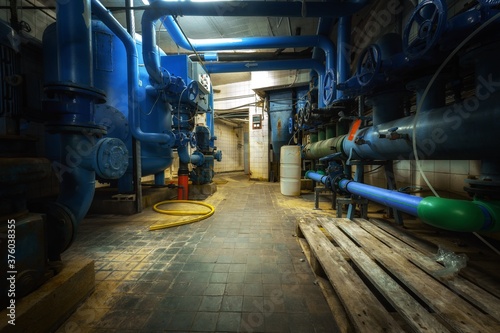 Boiler room full of pipes
