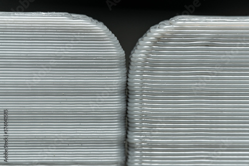 Multiple FDM 3D Printed Parts, one printed aat 0.2mm layer height the other printed with 0.3mm layer height.