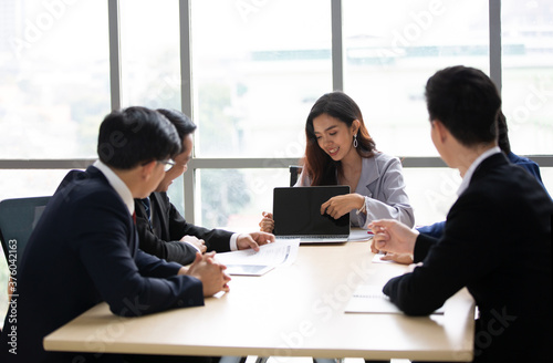 Divergent team of finance advisors brainstorming solution for company low income during COVID-19 pandemic 