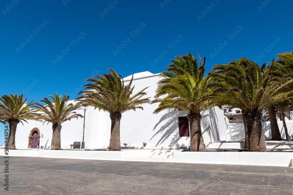 churches and palm trees on the island of lanzarote canary islands,