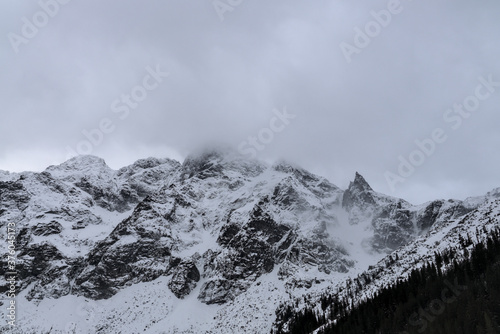 Fototapeta Naklejka Na Ścianę i Meble -  Misty and stormy Tatra Mountains around Morskie Oko lake, Tatra Mountains, Poland