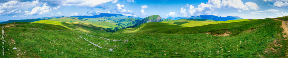 Grass meadows on the mountainside