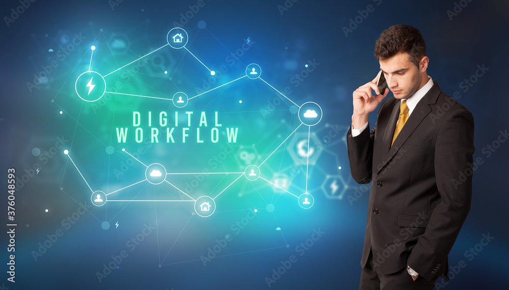 Businessman in front of cloud service icons with DIGITAL WORKFLOW inscription, modern technology concept Businessman in front of cloud service icons with DIGITAL WORKFLOW inscription, modern technology concept