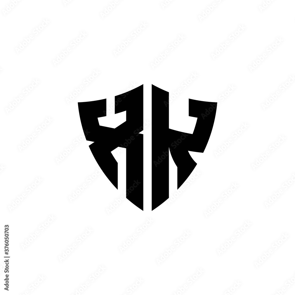 Obraz premium XK monogram logo with shield shape design template