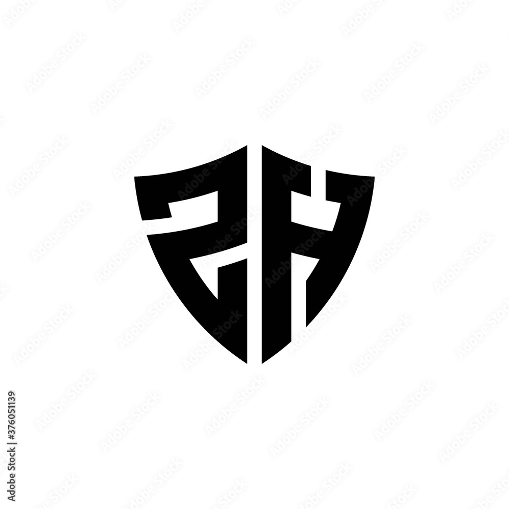 Obraz premium ZH monogram logo with shield shape design template