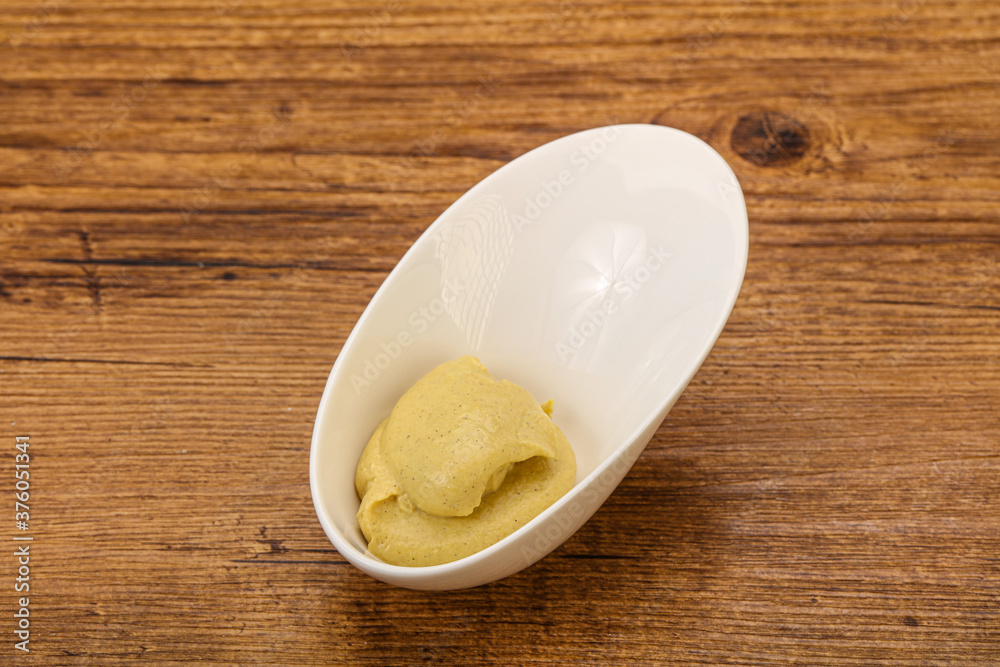 Dijon mustard sauce in the bowl Dijon mustard sauce in the bowl