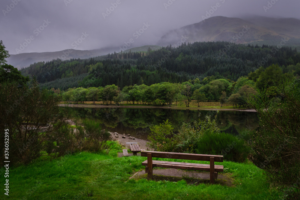 Lunaig lake in Loch Lomond and The Trossachs National Park on a foggy day, Highlands, Scotland Lunaig lake in Loch Lomond and The Trossachs National Park on a foggy day, Highlands, Scotland