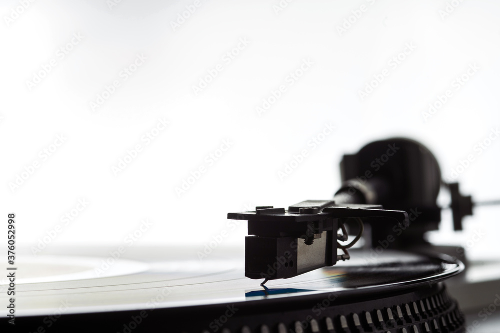 The needle on a vinyl record. Equipment for reproducing analog sound recordings. The needle on a vinyl record. Equipment for reproducing analog sound recordings.