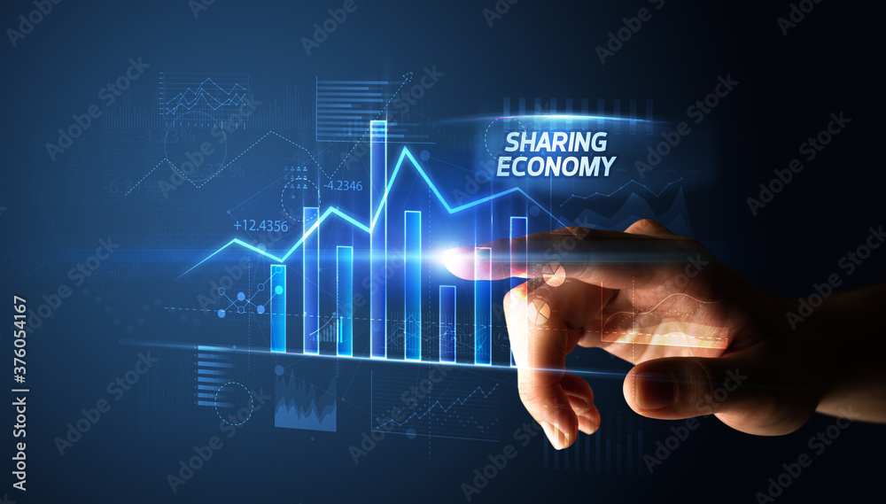 Hand touching SHARING ECONOMY button, business concept Hand touching SHARING ECONOMY button, business concept