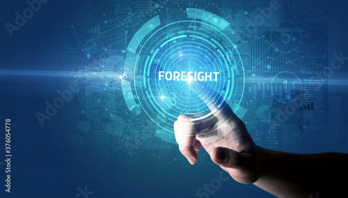 Hand touching FORESIGHT button, modern business technology concept photo