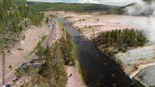Wallpaper Mural Midway Geyser Basin a smaller basin alongside the Firehole River. The largest hot spring in Yellowstone, Grand Prismatic Spring is also found here Torontodigital.ca