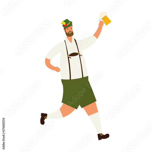 german man wearing tyrolean suit drinking beer