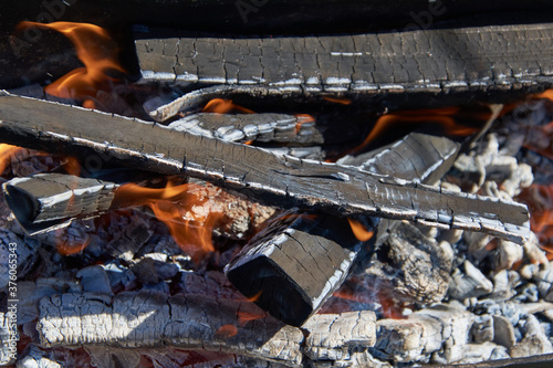 coals and flames in the grill