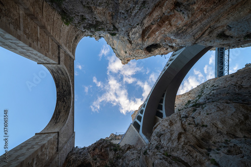 The spectacular stone bridge spanning over a very high narrow gorge