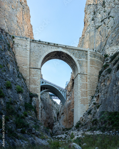 The spectacular stone bridge spanning over a very high narrow gorge