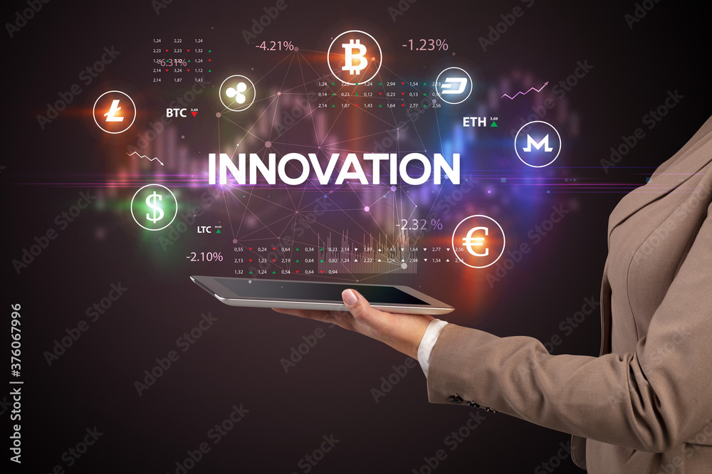Close-up of a touchscreen with INNOVATION inscription, business opportunity concept Close-up of a touchscreen with INNOVATION inscription, business opportunity concept