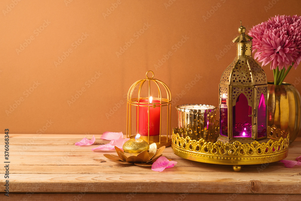 Diwali holiday home decorations on wooden table.