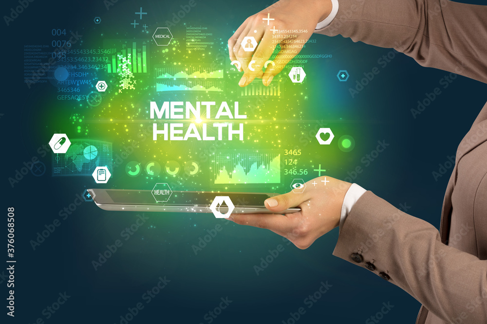 Close-up of a touchscreen with MENTAL HEALTH inscription, medical concept Close-up of a touchscreen with MENTAL HEALTH inscription, medical concept