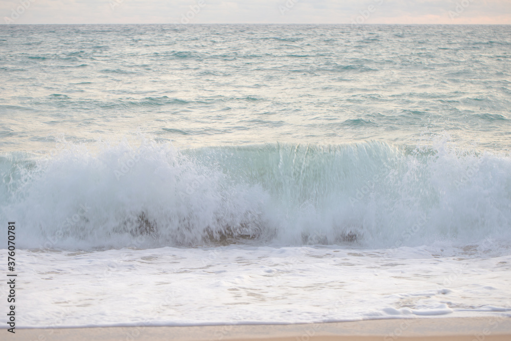 Sea wave on white snad beach close up Sea wave on white snad beach close up