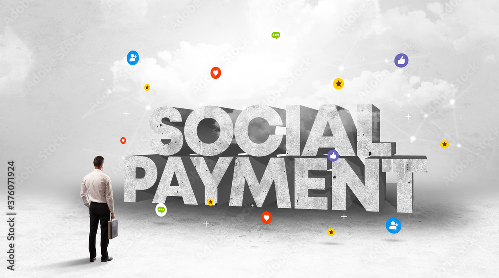 Young businessman standing in front of SOCIAL PAYMENT inscription, social media concept Young businessman standing in front of SOCIAL PAYMENT inscription, social media concept