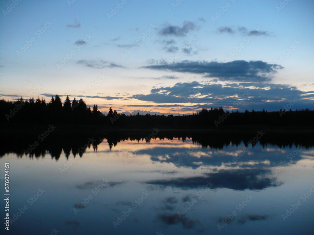 Fototapeta premium sunset over the lake