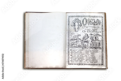 An old illustrated encyclopedia with the images of animals and objects of the surrounding world