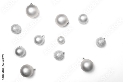 silver christmas balls on white background 